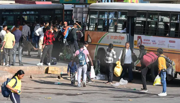 Stock image NEW DELHI, INDIA - MARCH 23, 2024: Passengers waiting for their Bus at Anand Vihar Railway Station, going to their home destination for celebration Holi Festival, on March 23, 2024 in New Delhi, India. 