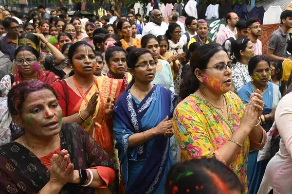 stock image KOLKATA, INDIA - MARCH 24, 2024: The International Society for Krishna Consciousness (ISKCON) devotees celebrate Holi festival with colours and music on March 24, 2024 in Kolkata, India