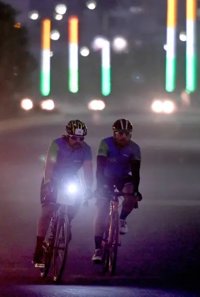 stock image GREATER NOIDA, INDIA - MARCH 17: Cyclists participate in a 55 kilometers long Cyclothon near Gaur city mall road, on March 17, 2024 in Greater Noida, India. HCL Cyclothon was organized under the aegis of Cycling Federation of India 