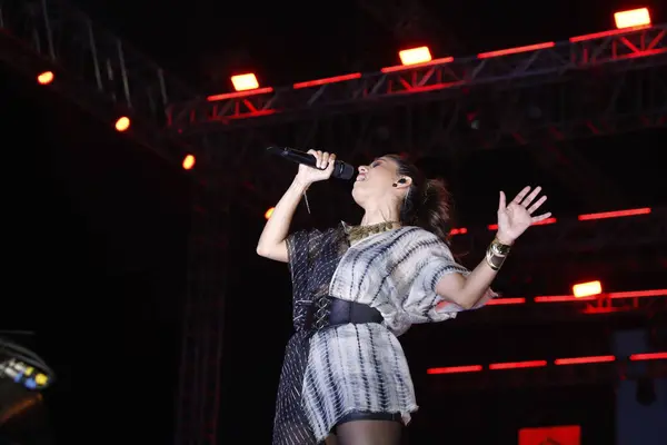 stock image NEW DELHI, INDIA - MARCH 2 2024: Bollywood singer Sunidhi Chauhan performs during an annual tech fest - Moksha - Innovision at Netaji Subhas University of Technology (NSUT)