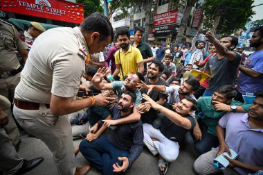 NEW DELHI, INDIA - JULY 28: Students seen protesting against the authorities outside Rau' IAS study circle in old Rajendra Nagar where few students were allegedly drowned to death after the basement of the building was flooded following heavy rain  clipart