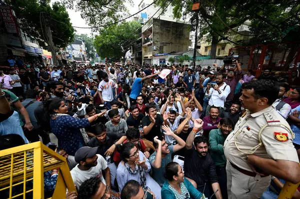 stock image NEW DELHI, INDIA - JULY 31: Students protest outside the Rau's coaching centre in Old Rajinder Nagar, where 3 UPSE aspirants died due to waterlogged last week, on July 31, 2024 in New Delhi, India. (Photo by Salman Ali/Hindustan Times )