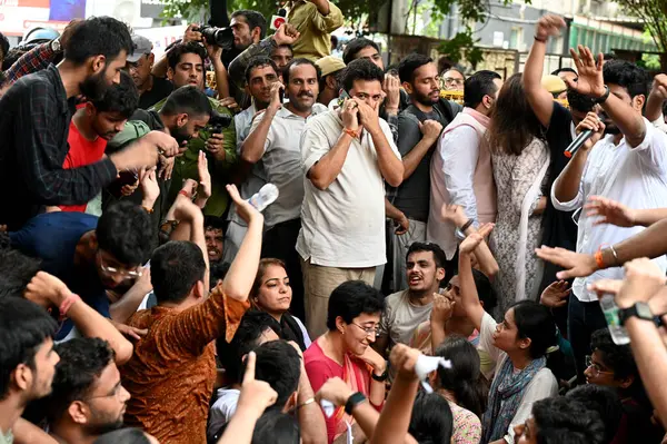 stock image NEW DELHI, INDIA - JULY 31: Delhi cabinet minister Atishi, Mayor Shelly Oberoi, MLA Durgesh Pathak arrived to meet students protest outside the Rau's coaching centre in Old Rajinder Nagar, where 3 UPSE aspirants died due to waterlogged last week, on 