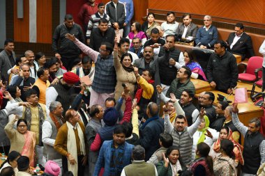 NEW DELHI, INDIA - FEBRUARY 7:  Opposition party councillors protest in front of Delhi Mayor Shelly Oberoi inside the Municipal Corporation of Delhi (MCD) c during the Special Meeting on the Revised Budget Estimates 2023-24, at the Shyama Prasad  clipart