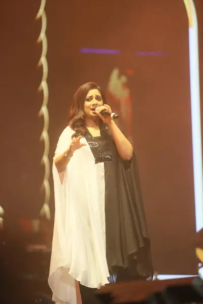 stock image NEW DELHI, INDIA - FEBRUARY 15, 2024: Bollywood singer Shreya Ghoshal performs at the Delhi Technological Universitys Engifest'24, on February 15, 2024 in New Delhi, India