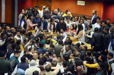 NEW DELHI, INDIA - FEBRUARY 8, 2024: Leader of House MCD Mukesh Goyal, and AAP Councillor celebrating after Pass MCD Budget of Delhi 24-25 during the Special Meeting of the Municipal Corporation of Delhi for Revised Budget Estimates 2023-24. clipart