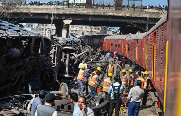 Stock image NEW DELHI, INDIA -FEBRUARY 17, 2024: A view of 10 wagons of a goods train derailed on the Patel Nagar-Dayabasti section. The incident happened when the train was passing under the Zakhira flyover on Saturday morning