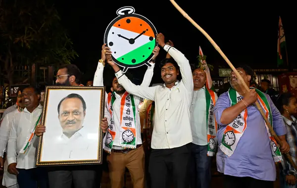 stock image MUMBAI, INDIA - FEBRUARY 6: NCP party workers of Ajit Pawar group celebrate after Election commission granted them 