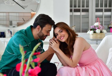 MUMBAI, INDIA - FEBRUARY 9, 2024: Bollywood actress Ankita Lokhande Jain with her husband, businessman Vicky Jain during an exclusive interview with HT City for the Valentines Day special shoot   clipart