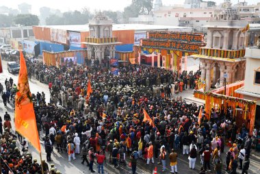 AYODHYA, INDIA - JANUARY 22, 2024: Thousand of devotees came from various part of the country gathered at the main enterence during the consecration ceremony of Shri Ram Janmbhoomi Temple on January 22, 2024 in Ayodhya, India.  clipart