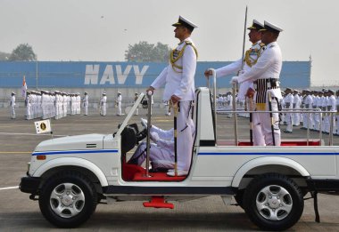 MUMBAI, INDIA - JANUARY 3, 2024: Vice Adm Sanjay. J. Singh inspects the ceremonial parade upon taking over as the FOC-in-C Western Naval Command from Vice Adm Dinesh K Tripathi at INS Shikra, Colaba on January 3, 2024 in Mumbai, India. clipart