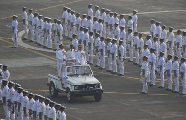 MUMBAI, INDIA - JANUARY 3, 2024: Vice Adm Sanjay. J. Singh inspects the ceremonial parade upon taking over as the FOC-in-C Western Naval Command from Vice Adm Dinesh K Tripathi at INS Shikra, Colaba on January 3, 2024 in Mumbai, India. clipart