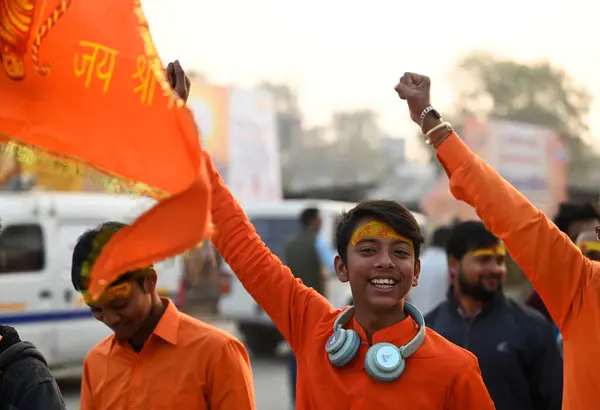 stock image AYODHYA, INDIA - JANUARY 23, 2024: Excited devotees standing in a long queue on Rampath to visit Ram temple  on January 23, 2024 in Ayodhya, India. Devotees are celebrating the consecration ceremony all over the world with joy and fanfare. 