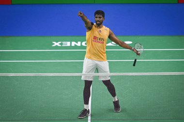 NEW DELHI, INDIA - JANUARY 18, 2024: Satwiksairaj Rankireddy with Chirag Shetty from India competes during the Mens doubles match against Lu Ching Yao with Yang Po Han of Taiwan at the Yonex-Sunrise India Open 2024 badminton tournament   clipart