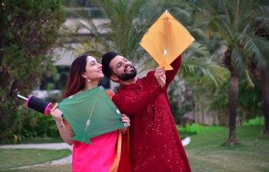 MUMBAI, INDIA - JANUARY 13, 2024: Bollywood singer Rahul Vaidya and his wife, actor Disha Parmar Vaidya pose during an exclusive interview with HT City for Makar Sankranti festival special shool clipart