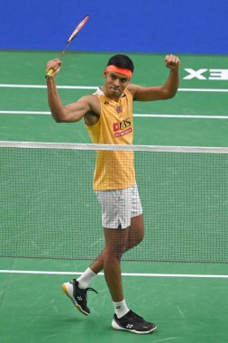 NEW DELHI, INDIA - JANUARY 18, 2024: Satwiksairaj Rankireddy with Chirag Shetty from India competes during the Mens doubles match against Lu Ching Yao with Yang Po Han of Taiwan at the Yonex-Sunrise India Open 2024 badminton tournament   clipart