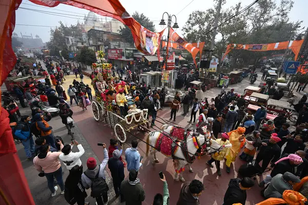 stock image NEW DELHI, INDIA  JANUARY 21, 2024: Luv Kush Ramlila committee organized Lord Ram Procession from Gauri Shankar temple Chandni Chowk, ahead of consecration of Ram temple at Ayodhya, on January 21, 2024 in New Delhi, India. 