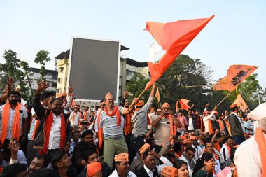 NAVI MUMBAI, INDIA - JANUARY 27, 2024: Huge Crowd gather at Chhatrapati Shivaji Maharaj Chowk Vashi, as Maratha Quota activist Manoj Jarange Patil ends protest after Maharashtra CM Eknath Shinde Government accepts all demands. clipart