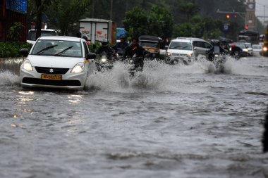 NAVI MUMBAI, INDIA - AUGUST 3, 2024: Water logging near Mafco Market, Turbhe, on August 3, 2024 in Navi Mumbai, India. clipart