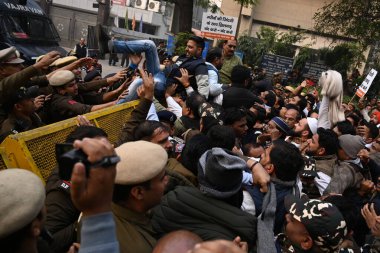 NEW DELHI, INDIA - DECEMBER 27, 2023: Delhi BJP members protest against the AAP Government for distribution of fake and substandard Medicines in Delhi government hospital at Deen Dayal Upadhyaya Marg on December 27, 2023 in New Delhi, India. clipart