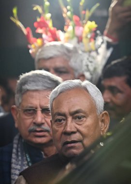 NEW DELHI, INDIA - DECEMBER 29, 2023: Bihar Chief Minister Nitish Kumar along with Rajiv Rajan Singh (Lalan Singh) after the National Executive Meeting of JDU at the constitution club of India at Rafi Marg on December 29, 2023 in New Delhi, India. clipart