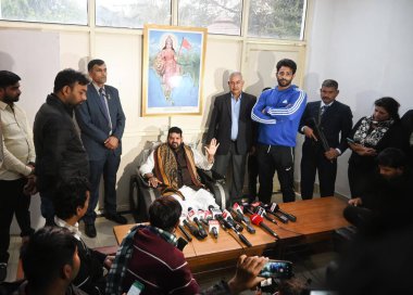 NEW DELHI, INDIA - DECEMBER 24: BJP MP Brij Bhushan Singh holding a press conference at his residence after the suspension of new elected WFI body by the sports Ministry, on December 24, 2023 in New Delhi, India. clipart