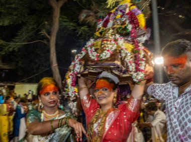 The biggest celebration in the transgender community, The widowhood is performed in an elaborate bangle-braking ceremony at Worli  on December 26, 2023 in Mumbai, India.  clipart