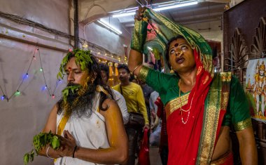 The biggest celebration in the transgender community, The widowhood is performed in an elaborate bangle-braking ceremony at Worli  on December 26, 2023 in Mumbai, India.  clipart