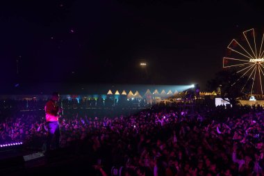 NEW DELHI, INDIA  DECEMBER 16: British singer and songwriter Jay Sean performs at Zomaland live event at Jawaharlal Nehru Stadium, on  December 16, 2023 in New Delhi, India clipart