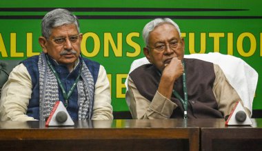 NEW DELHI, INDIA - DECEMBER 29, 2023: Bihar Chief Minister Nitish Kumar along with Lalan Singh President of the Janata Dal (United) arrive for the JDU National Executive Meeting at the constitution club of India at Rafi Marg. clipart