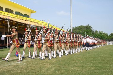 GURUGRAM, INDIA  AUGUST 13: Haryana Police personnel march past during the full dress rehearsal for the upcoming 77th Independence Day parade at Tau Devi Lal Stadium in Sector-38, on August 13, 2023 in Gurugram, India.  clipart