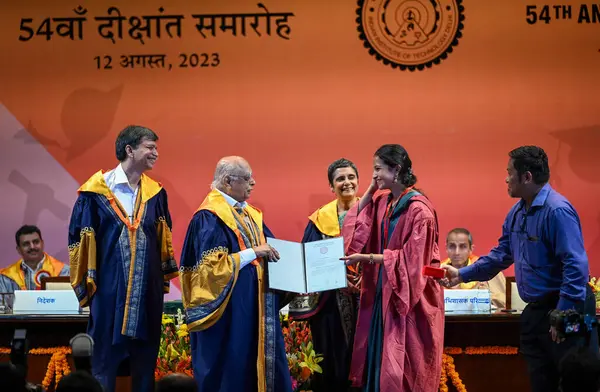 stock image NEW DELHI, INDIA  AUGUST 12: Newly Graduated students from IIT Delhi receives their degrees from Dr Gagandeep Kang, Chief Guest and Dr. Rajagopala Chidambaram, Chairperson of Board of Governors, IIT Delhi and Rangan Banerjee