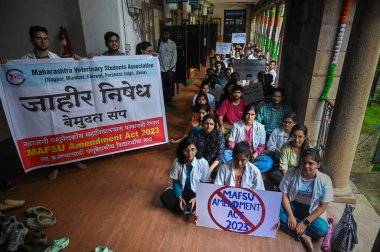 MUMBAI, INDIA - AUGUST 6: Students from the Veterinary College in Parel protest against the state government on August 6, 2024 in Mumbai, India. Around 4,000 students from various Veterinary Colleges including Mumbai, Nagpur, Parbhani, Udgir, Akola,  clipart