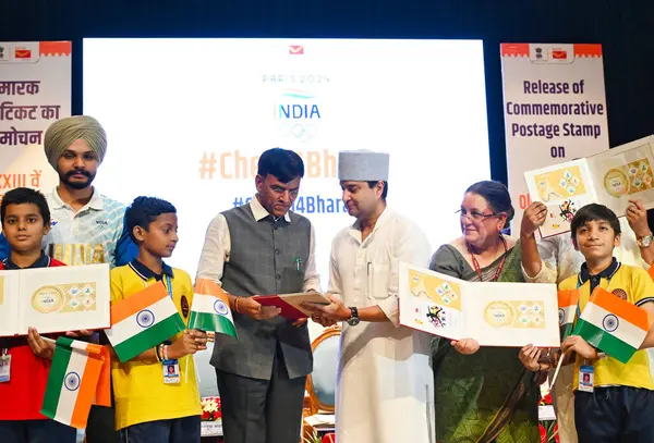 stock image NEW DELHI, INDIA - AUGUST 5:  Sports Minister Mansukh Mandaviya with Communications, Development of North Eastern Development Minister Jyotiraditya Scindia Released the Commemorative Postage Stamp on XXXIII Olympics Paris 2024 at Rang Bhawan