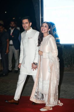 NEW DELHI, INDIA  - MAY 13, 2023: Bollywood actress Parineeti Chopra and AAP leader Raghav Chadha during their engagement ceremony at Kapurthala House, on May 13, 2023 in New Delhi, India  clipart