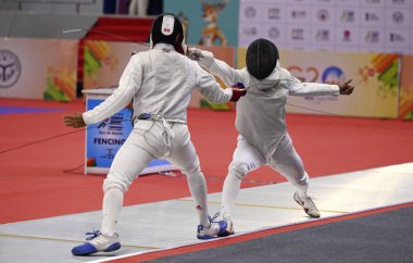 LUCKNOW, INDIA - MAY 31:  Mens Fencing pool round under 'Khelo India University Games at Atal Vihari Ekana Sports city  on May 31, 2023 in Lucknow, India.   clipart