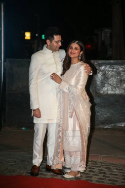 NEW DELHI, INDIA  - MAY 13, 2023: Bollywood actress Parineeti Chopra and AAP leader Raghav Chadha during their engagement ceremony at Kapurthala House, on May 13, 2023 in New Delhi, India  clipart