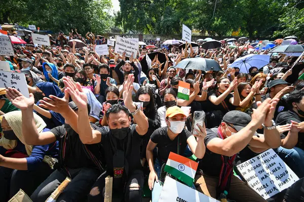 stock image NEW DELHI, INDIA - MAY 31: Tribal people of Manipur take part in a Tribal Solidarity protest against the ongoing tension in the state, at Jantar Mantar on May 31, 2023 in New Delhi, India. 