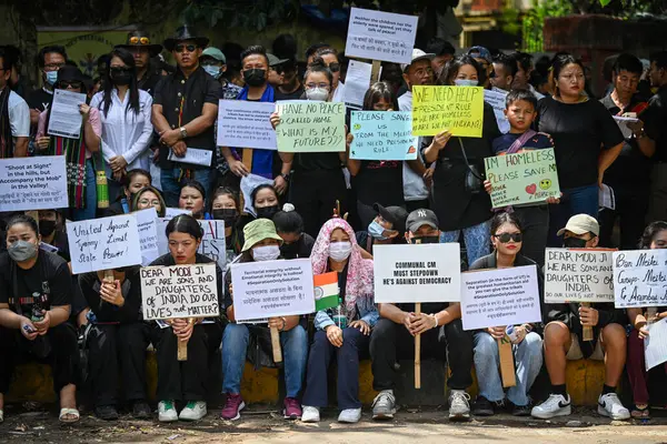 stock image NEW DELHI, INDIA - MAY 31: Tribal people of Manipur take part in a Tribal Solidarity protest against the ongoing tension in the state, at Jantar Mantar on May 31, 2023 in New Delhi, India. 