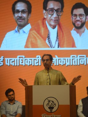 MUMBAI, INDIA - JUNE 24:  Shiv Sena (Uddhav Balasaheb Thackeray) chief Uddhav Thackeray speaks during a meeting of party's office bearers and public representatives, at Shivaji Mandir, Dadar on June 24, 2023 in Mumbai, India.   clipart