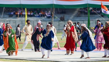 SRINAGAR, INDIA - AUGUST 13: Aritists in traditional Kashmiri attire perform during full dress rehearsal ahead of independence day at Bakshi Stadium on August 13, 2024 in Srinagar, India. ( Photo by Waseem Andrabi/Hindustan Times) clipart