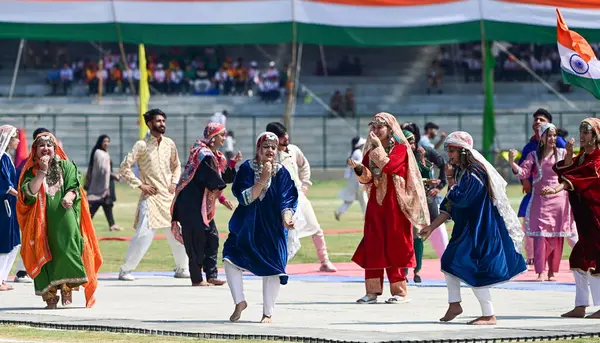 stock image SRINAGAR, INDIA - AUGUST 13: Aritists in traditional Kashmiri attire perform during full dress rehearsal ahead of independence day at Bakshi Stadium on August 13, 2024 in Srinagar, India. ( Photo by Waseem Andrabi/Hindustan Times)