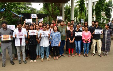 MUMBAI, INDIA - AUGUST 14: Doctors and medical students, FAIMA (Federation of All India Medical Association) calls for a nationwide shutdown of OPD services from today, protest against the sexual assault and murder of a woman post-graduate trainee (P clipart