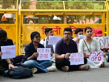 Doctors stage a protest in front of Nirman Bhawan against the brutal rape and murder of a postgraduate trainee doctor at Kolkatas RG Kar Hospital, on August 19, 2024 in New Delhi, India. (Photo by Vipin Kumar/Hindustan Times clipart