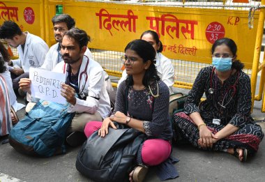 Resident Doctors shout slogans protesting in front of Health Ministry HQ Nirman Bhawan Main Road, demanding justice for the victim of Kolkatas RG Kar Hospital Tragedy, and demanding CPA, on August 19, 2024 in New Delhi, India. (Photo by Sonu Mehta/Hi clipart