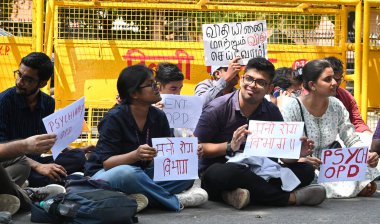 Resident Doctors shout slogans protesting in front of Health Ministry HQ Nirman Bhawan Main Road, demanding justice for the victim of Kolkatas RG Kar Hospital Tragedy, and demanding CPA, on August 19, 2024 in New Delhi, India. (Photo by Sonu Mehta/Hi clipart