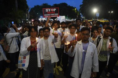 Resident Doctors take out a candle light march at Connaught Place, demanding justice for the victim of Kolkatas RG Kar Hospital Tragedy, on August 18, 2024 in New Delhi, India. (Photo by Sonu Mehta/Hindustan Times ) clipart