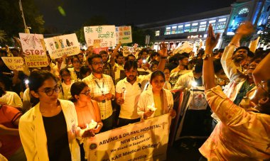 Resident Doctors of LHMC, Maulana Azad Medical College , RML,Safdarjung , GTB, DDU Hospitals and Members of various Resident Doctors��� Associations of Delhi protest during a candle march against the alleged rape and murder of a woman doctor at Kolka clipart