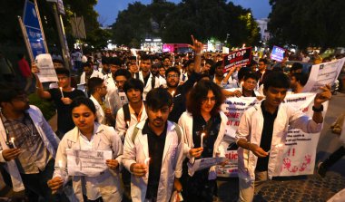 Resident Doctors of LHMC, Maulana Azad Medical College , RML,Safdarjung , GTB, DDU Hospitals and Members of various Resident Doctors��� Associations of Delhi protest during a candle march against the alleged rape and murder of a woman doctor at Kolka clipart