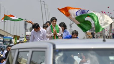 Supporters welcome with flowers to Wrestler Vinesh Phogat upon her arrival at IGI airport to her village in at Dawarka Express way on August 17, 2024 in New Delhi, India. Vinesh was heavily garlanded at the airport, where she broke down in tears at t clipart